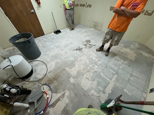 Crew tearing out the old room - Extreme Maintenance, Bullhead City AZ