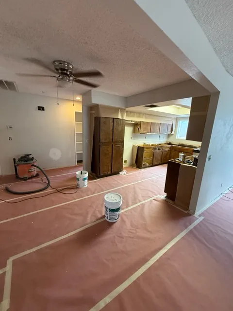 Floors protected during wall repair - Extreme Maintenance, Bullhead City AZ